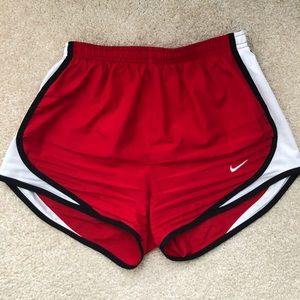 red nike shorts